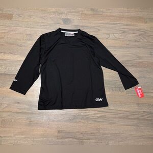 Game wear hockey under armor long sleeve shirt layer over equipment. Youth L/ XL
